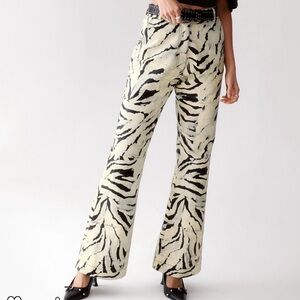 Zebra print real leather pants.